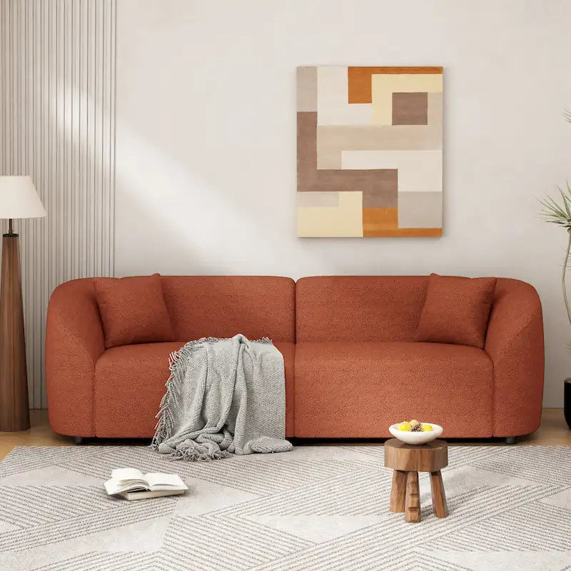Canapé incurvé 3 places en tissu bouclé orange/beige