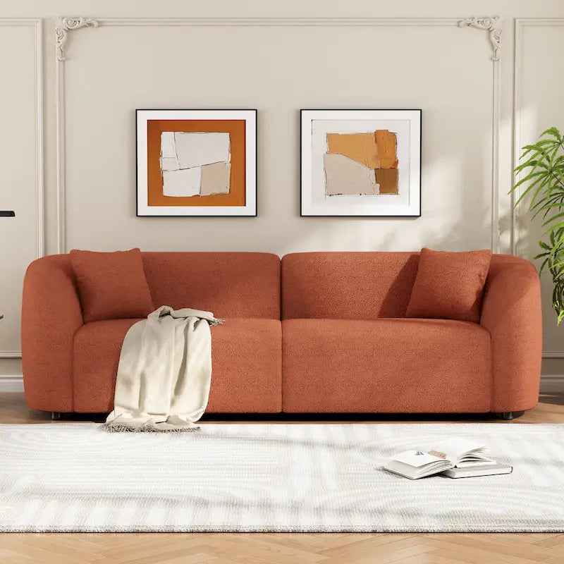 Canapé incurvé 3 places en tissu bouclé orange/beige