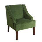 Fauteuil d'appoint individuel en velours vert avec accoudoirs incurvés